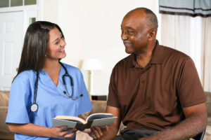 Nurse helping old guy understanding the different plans