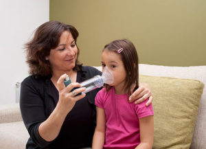 Mom giving her daughter the right medicine. 