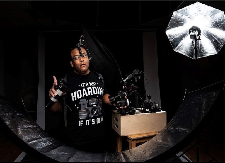 Jerry in his Providence studio. He found this shirt online and was inspired to show off some of his photo/video equipment. ”I’m kind of a gear hoarder, like really bad lol. Photography is also my coping mechanism.”