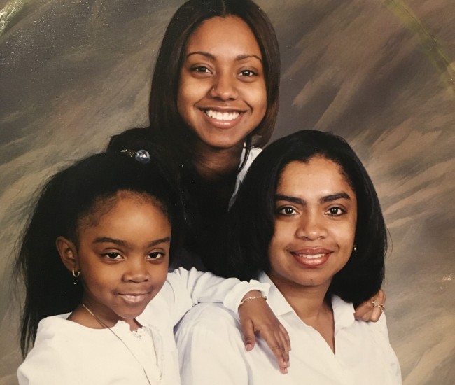 A 16-year-old Natalya (in back) with her sister Alexia and her Mom Syvonne.